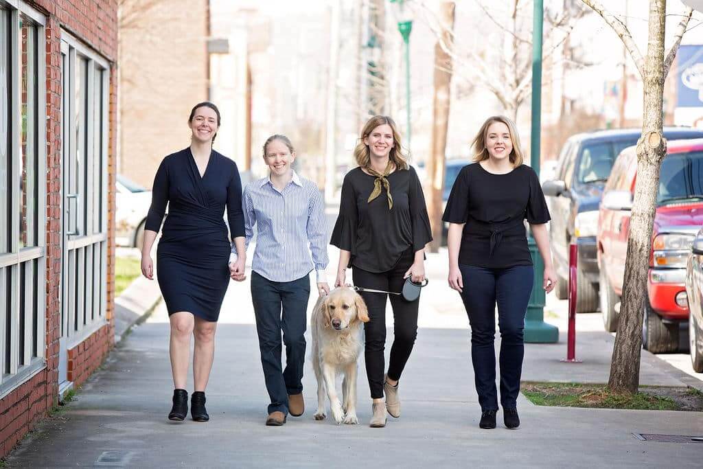 Izell Marketing Group staff walking outside