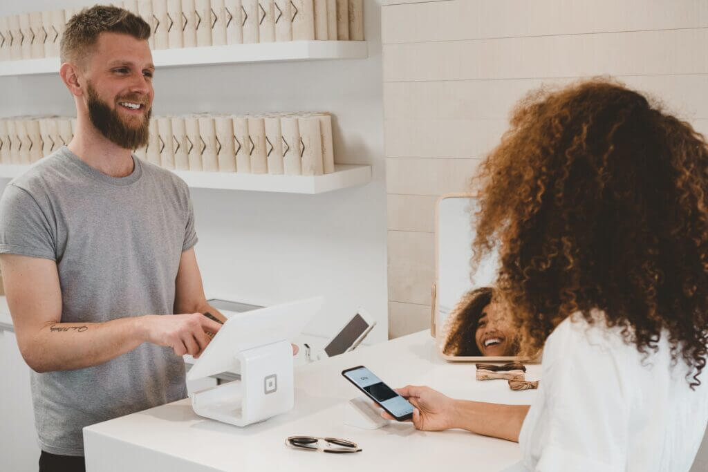 customer purchasing at checkout