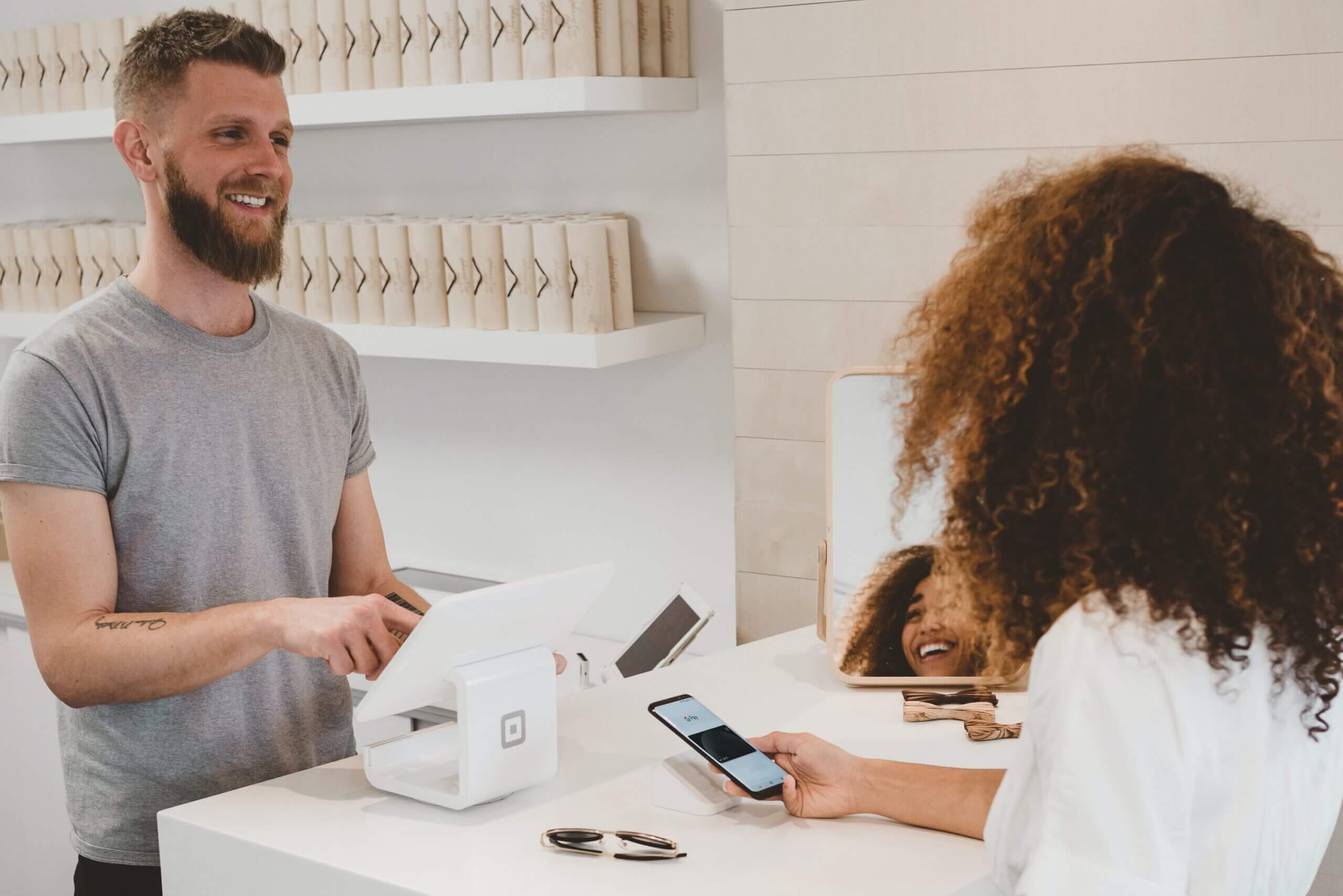 customer purchasing at checkout